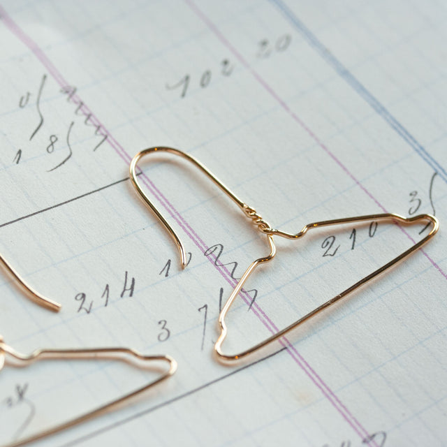 Boucles d’oreilles de cintre d’or